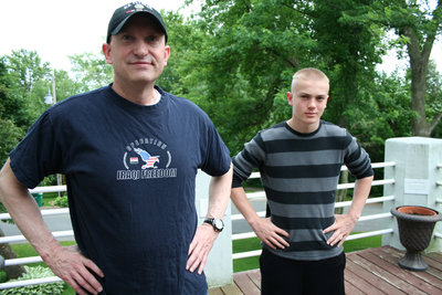 Dave Hatteberg and his son, Peter, outside their Chanhassen home Dave Hatteberg and his son, Peter, outside their Chanhassen home